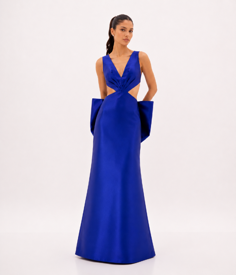 VESTIDO LONGO COM DECOTE EM V, RECORTE NA CINTURA E LAÇO ESCULTURAL - PRÉ VENDA